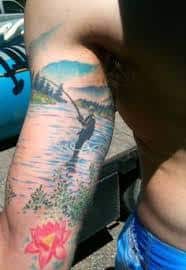 Fish Tattoo On Man Back