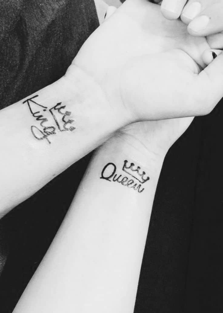 One line chess queen tattoo located on the inner arm.