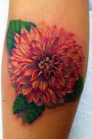 My first tattoo a blue dahlia on my hip Now 9 years old  ragedtattoos