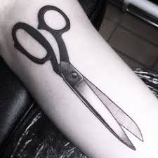 Cropped Hand With Tattoo Holding Scissors Over White Background Stock Photo   Alamy